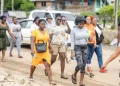 Vendors visiting the proposed location for the market tarmac (DPI photo)