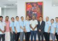 Minister of Health Dr. Frank Anthony (centre) with the Chinese doctors (in blue) and other members of Guyana's health team