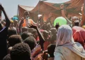 CORRECTS BYLINE.- This photo released by The Norwegian Refugee Council (NRC), shows displaced children from el-Fasher playing at a camp where they sought refuge from fighting between government forces and the RSF, in Tawila, Darfur region, Sudan, Monday, Nov. 3, 2025. (Sarah Vuylsteke/NRC via AP)
