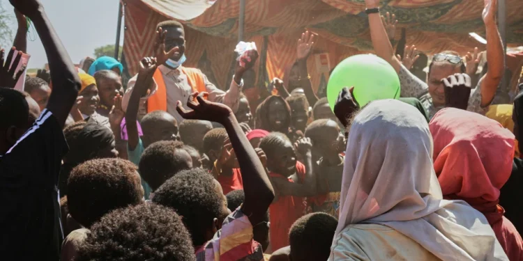 CORRECTS BYLINE.- This photo released by The Norwegian Refugee Council (NRC), shows displaced children from el-Fasher playing at a camp where they sought refuge from fighting between government forces and the RSF, in Tawila, Darfur region, Sudan, Monday, Nov. 3, 2025. (Sarah Vuylsteke/NRC via AP)