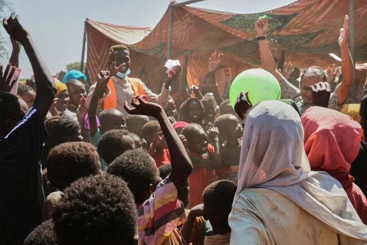 CORRECTS BYLINE.- This photo released by The Norwegian Refugee Council (NRC), shows displaced children from el-Fasher playing at a camp where they sought refuge from fighting between government forces and the RSF, in Tawila, Darfur region, Sudan, Monday, Nov. 3, 2025. (Sarah Vuylsteke/NRC via AP)