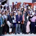 Students, holding their certificates of completion from the Akademi bootcamp, posed for photos with Quisqueya University Rector Jacky Lumarque and Vice-Rector Evenson Calixte after the ceremony in Port-au-Prince on November 9, 2025. Photo courtesy of Akademi.