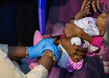 © UNICEF/Ahmed Mohamdeen Elfatih A baby receives a malaria vaccine in Sudan.