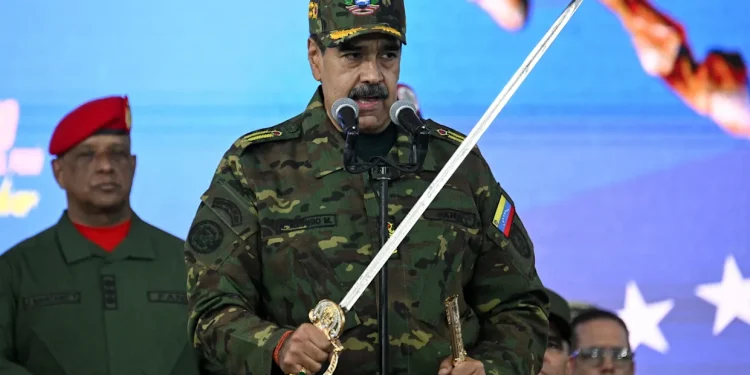 Nicolas Maduro brandished the sword of Venezuelan independence hero Simon Bolivar at a protest against US threats - Federico PARRA/AFP via Getty Images