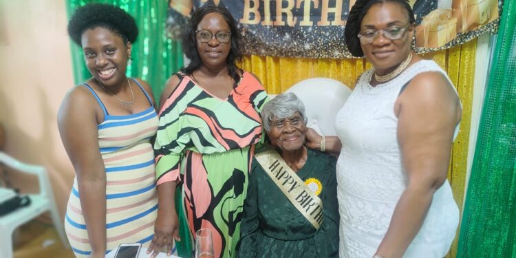 L-R Jasmine Hackett (PNCR Councillor, Reg 4, fmr Minister of Foreign Affairs Dr. Karen Cummings, 106-year-old Ruby Mingo and and Member of Parliament and GTU President Coretta McDonald