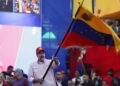 Venezuelan President Nicolas Maduro waves the Venezuelan national flag during a rally in Caracas, capital of Venezuela, Dec. 1, 2025. (Str/Xinhua)
