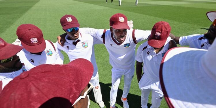 West Indies' captain Roston Chase (C) talks to his players before the start of play against New Zealand on Day 4 of their Test match in Christchurch, New Zealand, on December 5. (via AP) -
West Indies' captain Roston Chase (C) talks to his players before the start of play against New Zealand on Day 4 of their Test match in Christchurch, New Zealand, on December 5. (via AP)