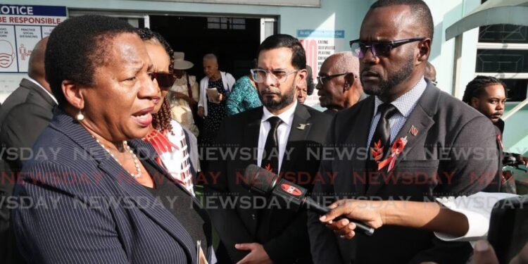 Opposition Leader Pennelope Beckles speaks to the media, after the funeral of PNM stalwart Ferdinand 'Ferdie' Ferreira, at Seventh-Day Adventist Church, Stanmore Avenue, Port of Spain, on December 16. - Photo by Angelo Marcelle