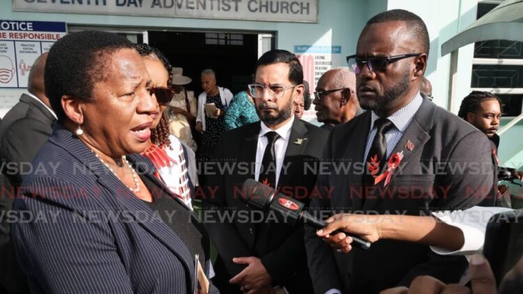 Opposition Leader Pennelope Beckles speaks to the media, after the funeral of PNM stalwart Ferdinand 'Ferdie' Ferreira, at Seventh-Day Adventist Church, Stanmore Avenue, Port of Spain, on December 16. - Photo by Angelo Marcelle