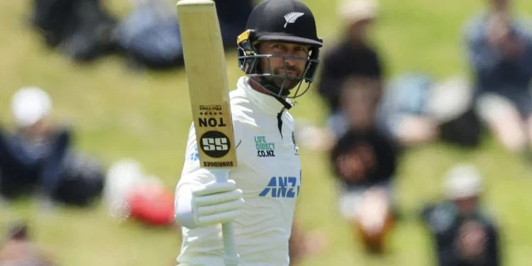 Devon Conway raises his bat after getting to his first half-century against West Indies  •  Getty Images