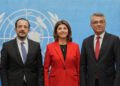 Republic of Cyprus President Nikos Christodoulides, United Nations Secretary-General's Personal Envoy on Cyprus, Maria Angela Holguin Cuellar, and Turkish Cypriot leader Tufan Erhurman pose for a photograph at the U.N. compound inside the UN buffer zone, in Nicosia, Cyprus, December 11, 2025. Petros Karadjias/Pool via REUTERS Purchase Licensing Rights