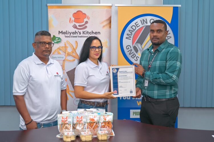 Founders, Mark Singh and Alyssa Singh, receive the GNBS Made in Guyana Certificate from Head of Certification Services Dept. (ag), Keon Rankin
