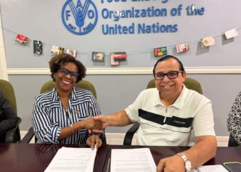 L-R Dr. Gillian Smith, FAO Representative in Guyana and Mr. Enrique Monize, Commissioner and Chief Executive Officer of GLSC