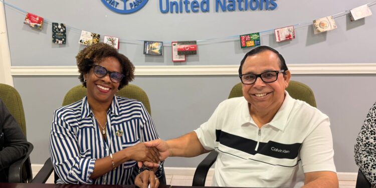 L-R Dr. Gillian Smith, FAO Representative in Guyana and Mr. Enrique Monize, Commissioner and Chief Executive Officer of GLSC