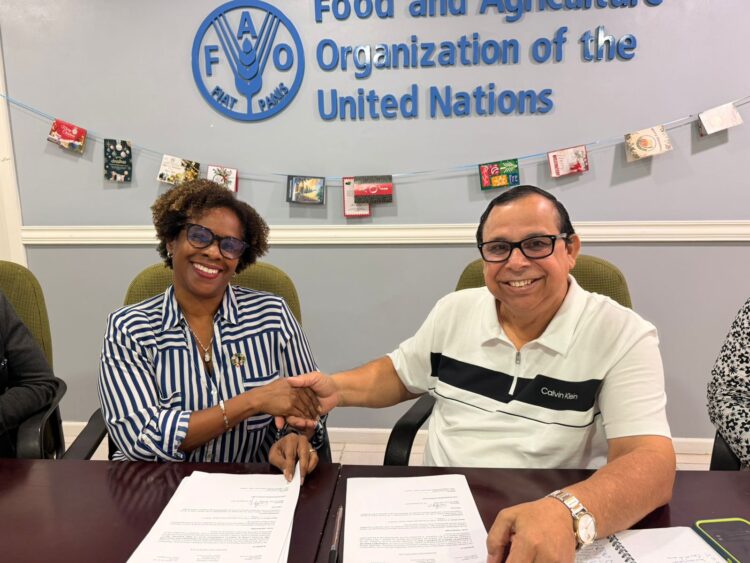 L-R Dr. Gillian Smith, FAO Representative in Guyana and Mr. Enrique Monize, Commissioner and Chief Executive Officer of GLSC