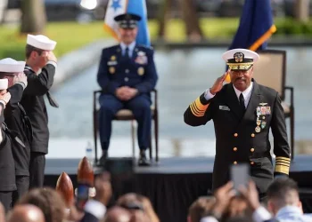 Navy Adm. Alvin Holsey salutes during a relinquishment of command and retirement ceremony at US Southern Command in Doral, Florida, on Friday, December 12, 2025. Rebecca Blackwell/AP