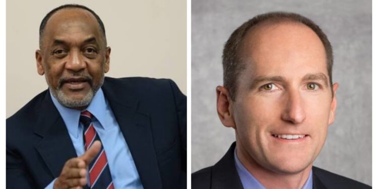 L-R Dr Vincent Adams and ExxonMobil President Alistair Routledge