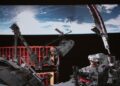 This screen image captured at Beijing Aerospace Control Center on December 9 shows Shenzhou-21 astronauts performing extravehicular activities outside China's orbiting space station (XINHUA)