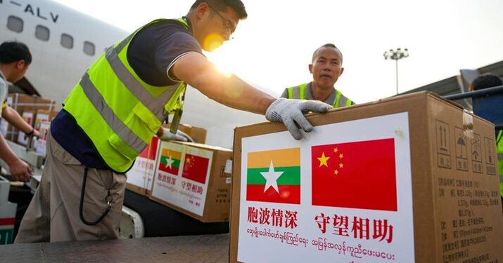 Staff members load donated medical supplies onto a plane at Dehong Mangshi Airport in Mangshi City, Dehong Dai and Jingpo Autonomous Prefecture, southwest China's Yunnan Province, on April 1 (XINHUA)