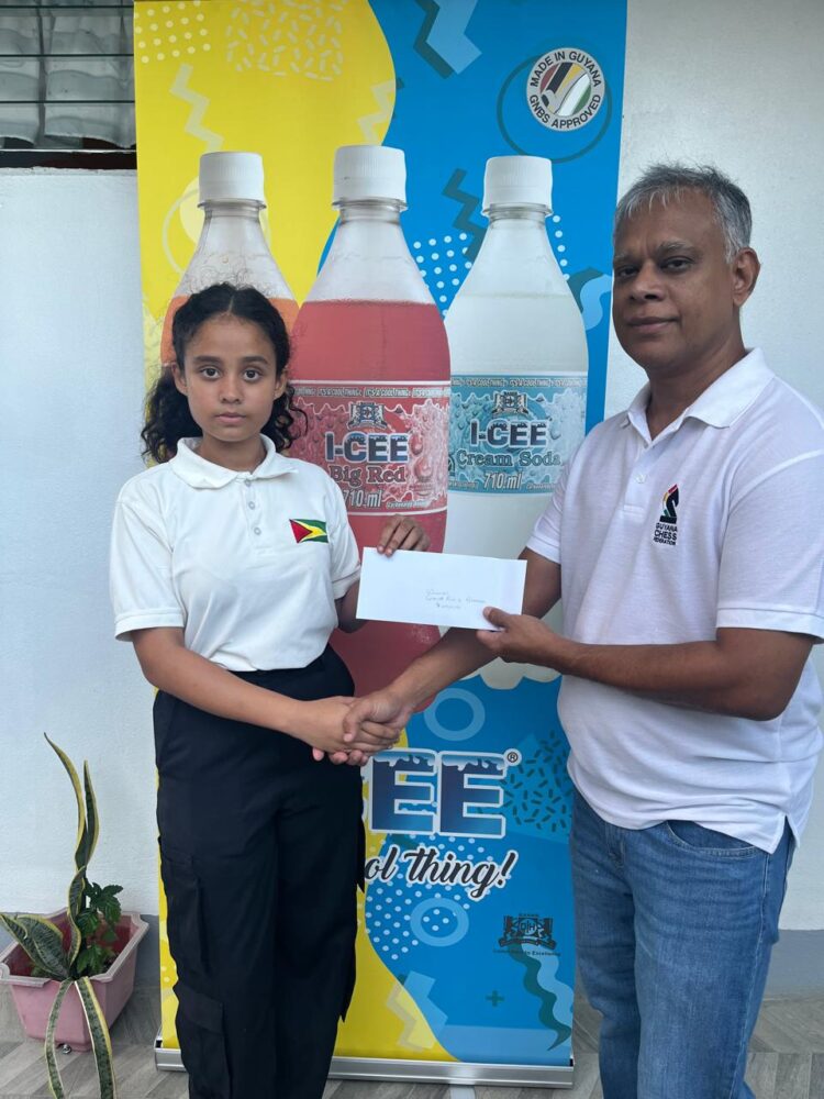 WCM Aditi Joshi receives her prize from GCF's President
