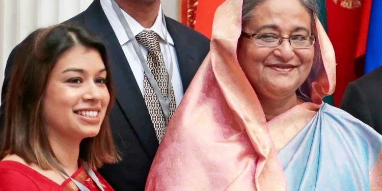British lawmaker Tulip Siddiq, left, and ousted Bangladeshi Prime Minister Sheikh Hasina in Moscow in 2013.Mikhail Metzel / AP file