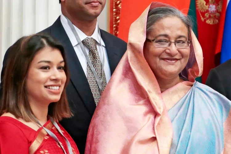 British lawmaker Tulip Siddiq, left, and ousted Bangladeshi Prime Minister Sheikh Hasina in Moscow in 2013.Mikhail Metzel / AP file
