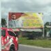 Billboard of President Ali's promised cash grant