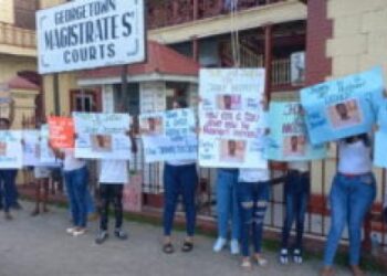 Family and friends of one of the accused men calling for his release outside the Magistrates’ Court on Tuesday