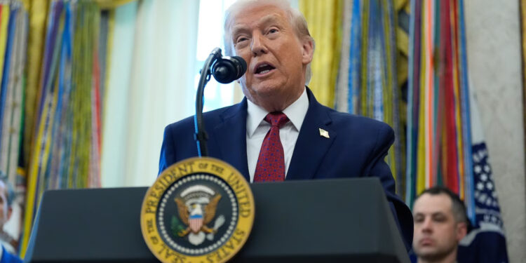 President Donald Trump speaks during a Mexican Border Defense Medal presentation in the Oval Office at the White House in Washington, December 15, 2025.