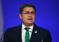 Honduras’ President Juan Orlando Hernandez speaks during the opening ceremony of the UN Climate Change Conference COP26 in Glasgow, Scotland, Monday Nov. 1, 2021. Andy Buchanan/Pool via AP, File)