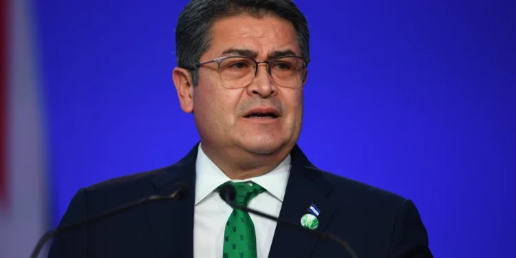 Honduras’ President Juan Orlando Hernandez speaks during the opening ceremony of the UN Climate Change Conference COP26 in Glasgow, Scotland, Monday Nov. 1, 2021. Andy Buchanan/Pool via AP, File)