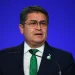 Honduras’ President Juan Orlando Hernandez speaks during the opening ceremony of the UN Climate Change Conference COP26 in Glasgow, Scotland, Monday Nov. 1, 2021. Andy Buchanan/Pool via AP, File)