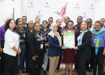 Caribbean Airlines CEO Ag., Nirmala Ramai (centre) with team members from the Operations Division, winners of the Caribbean Airlines Sustainability Leaderboard Challenge for H1 2025.