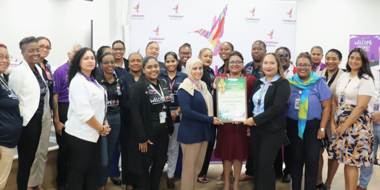 Caribbean Airlines CEO Ag., Nirmala Ramai (centre) with team members from the Operations Division, winners of the Caribbean Airlines Sustainability Leaderboard Challenge for H1 2025.