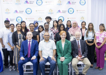 (Front row seated, left to right) ExxonMobil Guyana Limited President Alistair Routledge, representing the Greater Guyana Initiative; Guyana Minister of Health Hon. Dr. Frank Anthony; and Dr. Rachel Vreeman and Dr. Jeb Weisman of the Mount Sinai Health System, with students from the inaugural class of the Guyana Digital Health Training Institute in Georgetown, Guyana. Credit: Courtesy of the Ministry of Health, Guyana