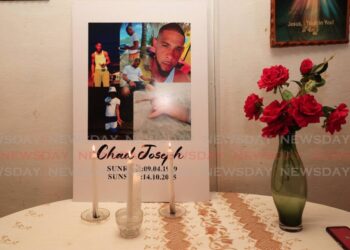 A photograph of Las Cuevas fisherman Chad Joseph during a memorial at the Joseph family home in Maracas Village on October 22, 2025. - Photo by Faith Ayoung