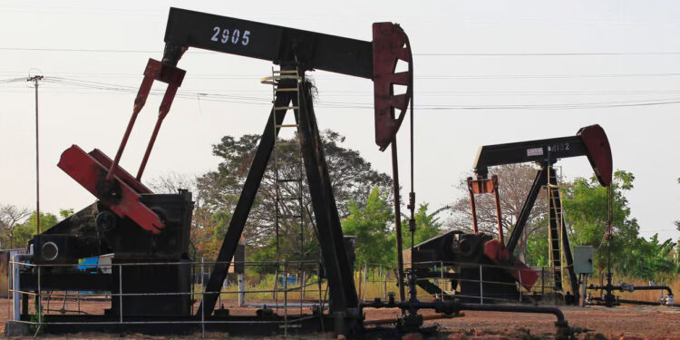 Oil pumpjacks in Lagunillas. Fixing Venezuela’s oil industry infrastructure would take many years and cost tens of billions of dollars. Photograph: Isaac Urrutia/Reuters