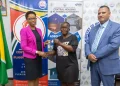 Minister within the Ministry of Housing, Vanessa Benn, presenting keys to a new core home.