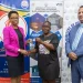 Minister within the Ministry of Housing, Vanessa Benn, presenting keys to a new core home.