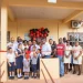 Minister of Health Dr Frank Anthony, along with residents and staff participating in the ribbon cutting