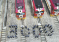 Railway workers from China and Kenya stand before locomotives and form the number "3000" at the locomotive operation and maintenance yard in Nairobi on Aug 19, marking 3,000 days of safe operation of the Mombasa-Nairobi Standard Gauge Railway. YANG GUANG/XINHUA