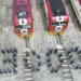 Railway workers from China and Kenya stand before locomotives and form the number "3000" at the locomotive operation and maintenance yard in Nairobi on Aug 19, marking 3,000 days of safe operation of the Mombasa-Nairobi Standard Gauge Railway. YANG GUANG/XINHUA