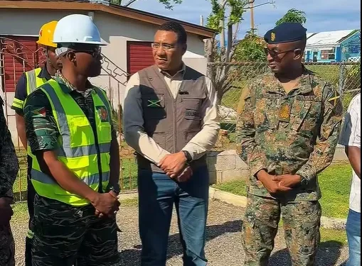 Prime Minister Holness engaging with GDF members at White House, Westmoreland