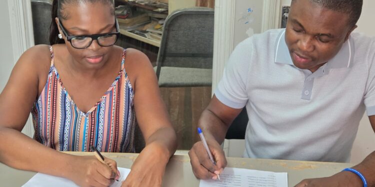 L-R FGM Councillor Shondell Jerrick and WIN Councillor Mark Goring signing the resolution today (Jan 22, 2026)