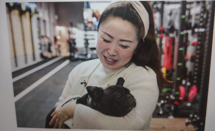 Angela He with her dog, Meiqiu, in Beijing on Wednesday. Fred Dufour / NBC News