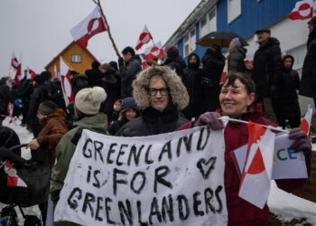 People attend a protest against U.S. President Donald Trump's demand that the Arctic island be ceded to the U.S., calling for it to be allowed to determine its own future, in front of the U.S. consulate in Nuuk, Greenland, January 17, 2026. REUTERS/Marko Djurica Purchase Licensing Rights