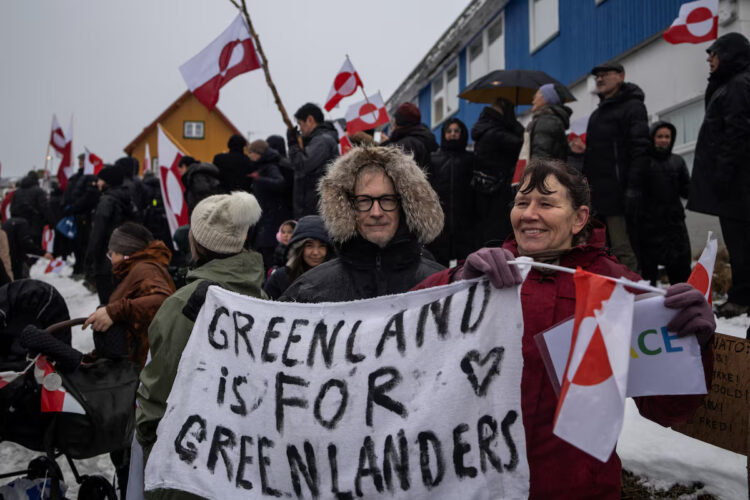 People attend a protest against U.S. President Donald Trump's demand that the Arctic island be ceded to the U.S., calling for it to be allowed to determine its own future, in front of the U.S. consulate in Nuuk, Greenland, January 17, 2026. REUTERS/Marko Djurica Purchase Licensing Rights