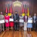 President Dr irfaan Ali (at centre), along with the seven members of the Teaching Service Commission (holding their instruments of appointment) and Minister of Education, Sonia Parag (fourth from right) and Minister of Public Service, Government Efficiency and Implementation (second from right) (Delano Williams photo- Guyana Chronicle)