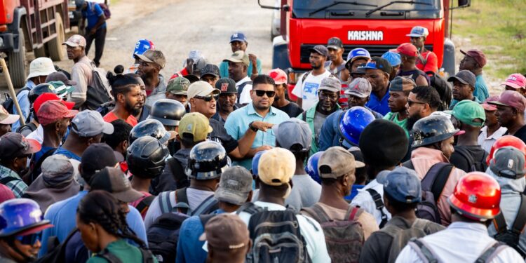 WIN Leader Azruddin Mohamed (in sun shades) surrounded by Albion Estate 1/16/2026