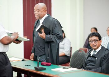 L-R Requesting state lead counsel, Terrence Williams KC and Attorney General Anil Nandlal SC